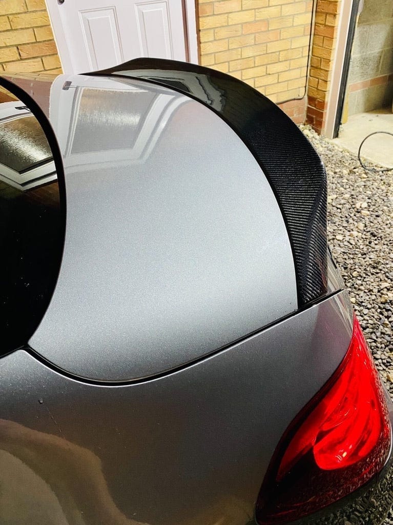 Mercedes C63/C-Class W205 saloon carbon spoiler by CT Carbon, showcasing sleek aerodynamic design and high-quality carbon fiber finish.