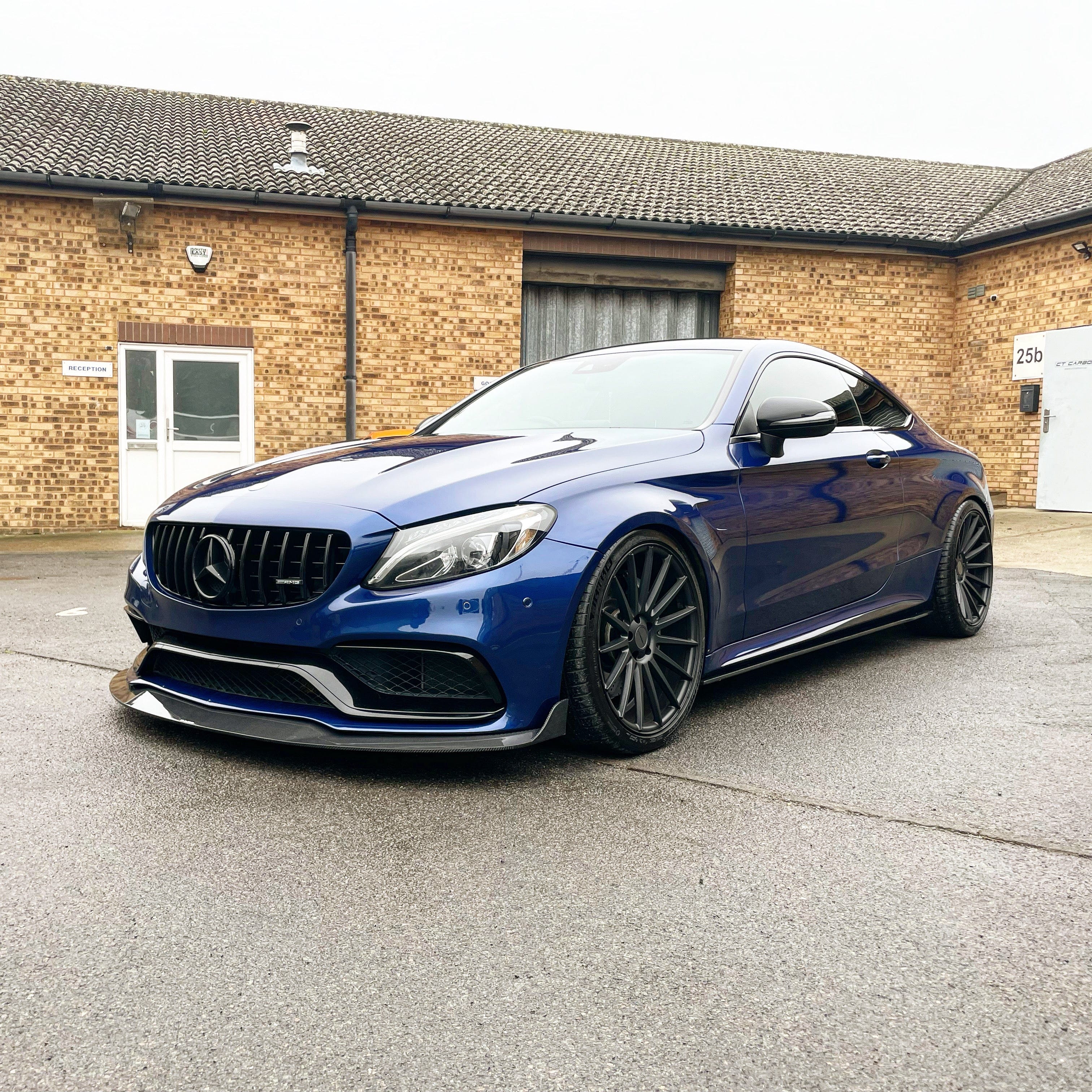 Mercedes W205 C63 coupe or convertible carbon fibre splitter by CT Carbon, showcasing its sleek aerodynamic design.