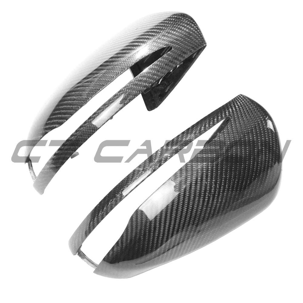 Mercedes W205/W213 carbon fiber side mirror accessories by CT Carbon, RHD only, showing sleek carbon fiber finish on mirrors.