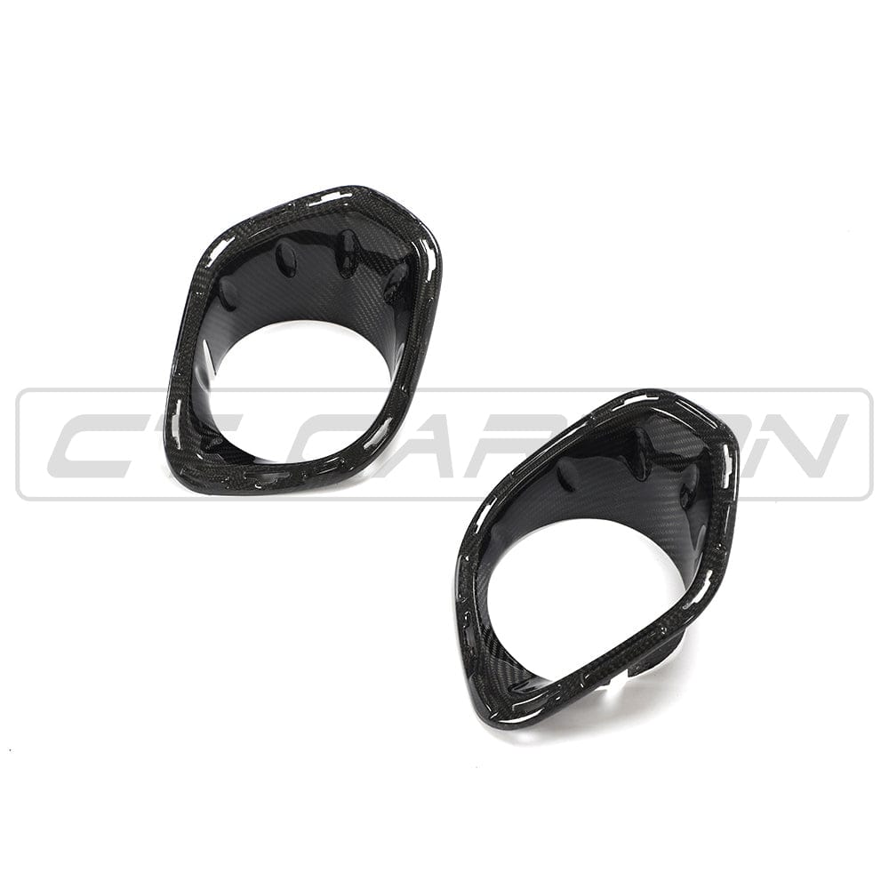Carbon fiber fog light covers for MINI Cooper S and JCW F56 by CT Carbon, showcasing sleek, lightweight accessories for enhanced style.