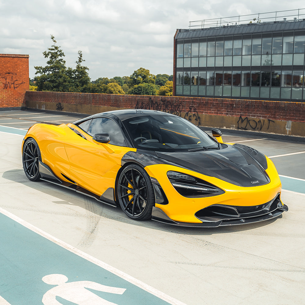 MCLAREN 720S carbon fibre front fenders by CT Design, showing sleek, lightweight aerodynamic car parts on a white background.