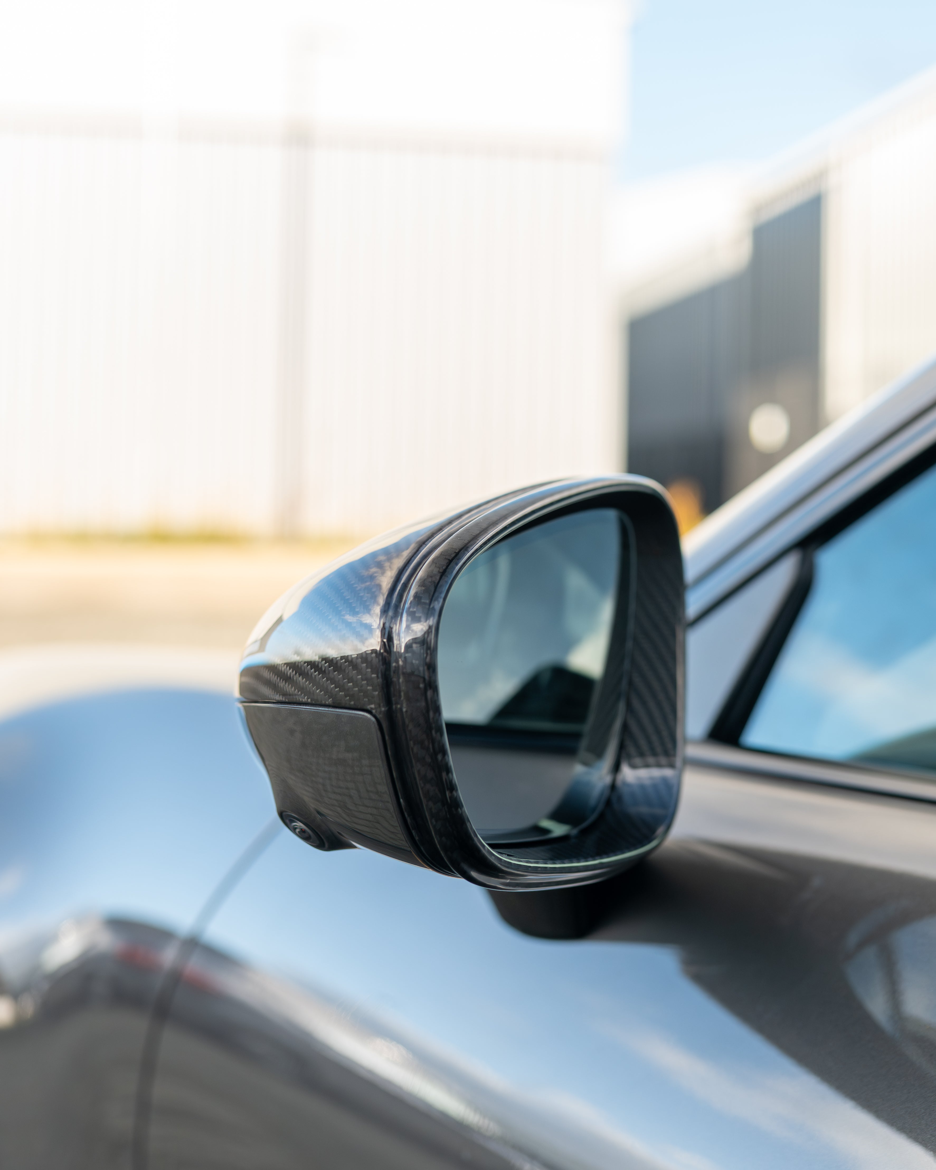 Porsche 911 992 carbon fiber side mirrors by CT Carbon, RHD only, showing sleek, lightweight mirror covers on the vehicle.