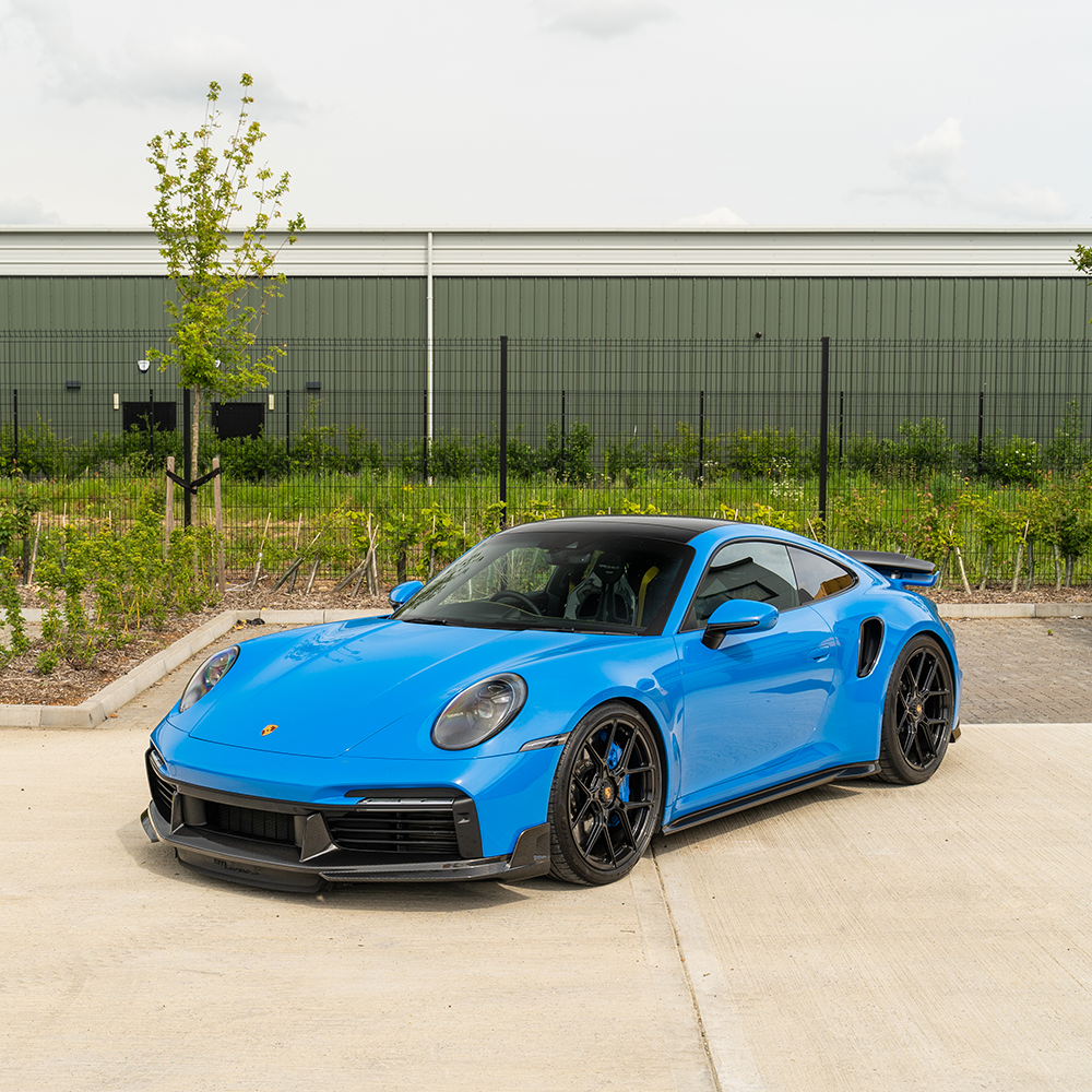 Porsche 911 (992) Turbo S carbon fibre side skirts kit by CT Design, showcasing sleek, lightweight automotive body enhancements.