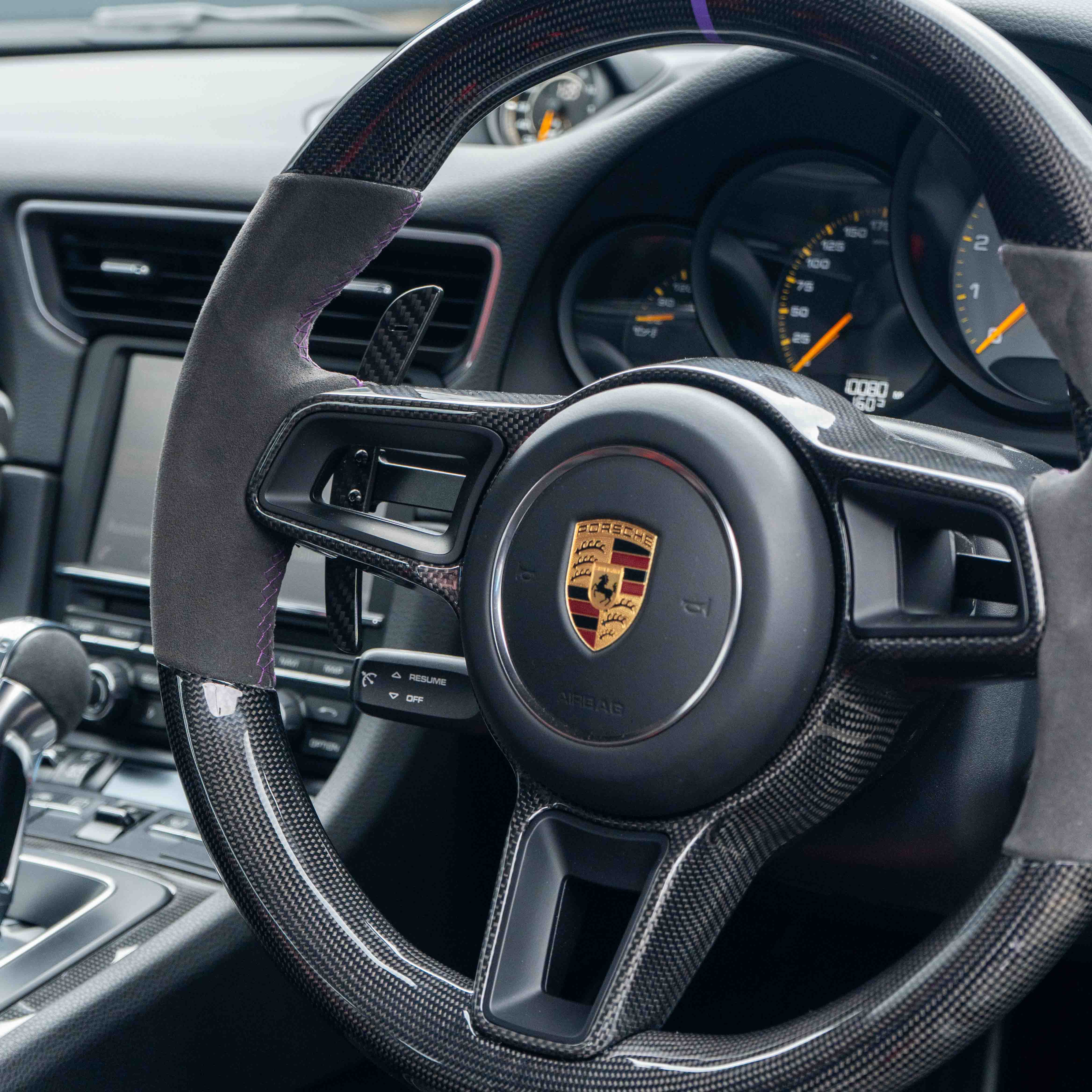 Carbon fiber paddle shifters for Porsche 911, Cayman, Boxster, Cayenne, Macan 2013+ by CT Carbon, magnetic installation.