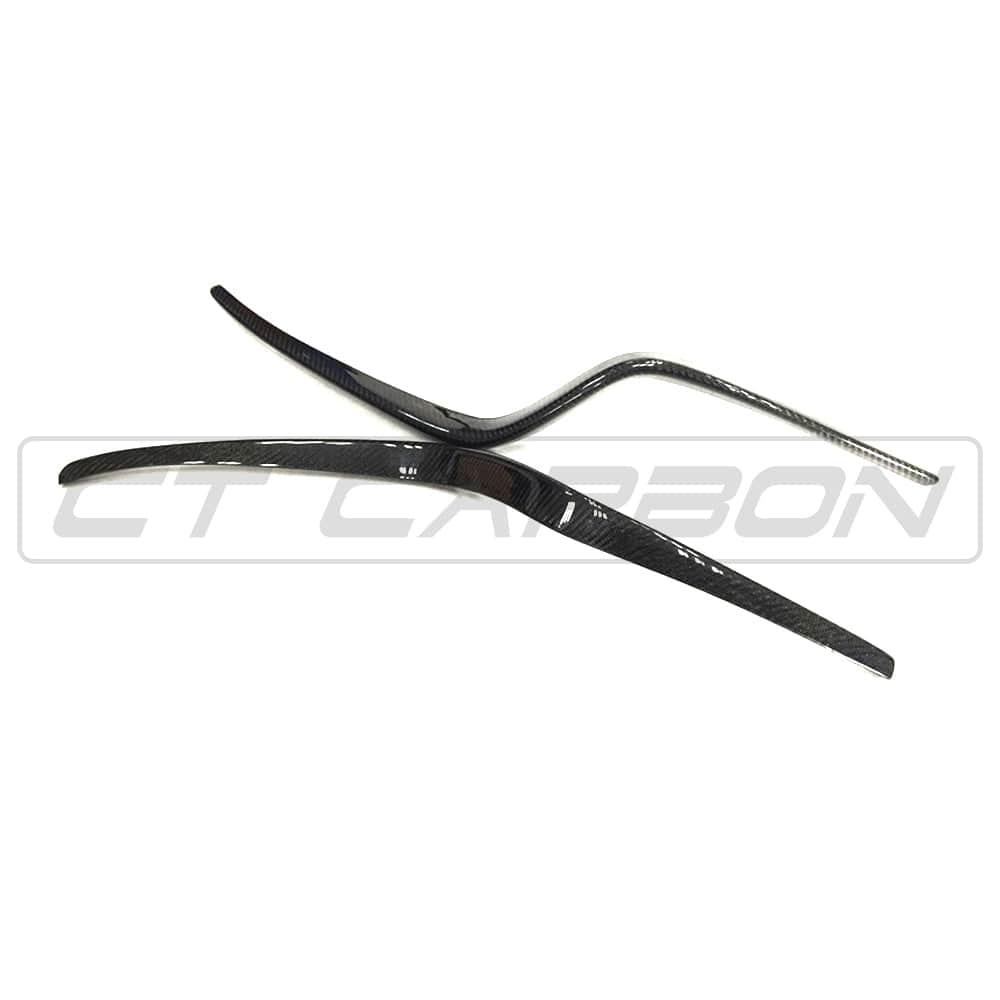 Carbon fiber front bumper trim for Porsche Macan 2014-2017 by CT Carbon, shown on the vehicle's front bumper.