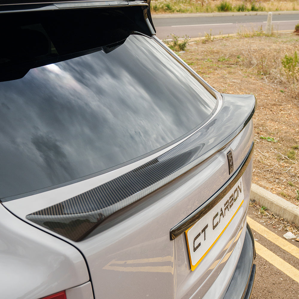 Rolls Royce Cullinan carbon fibre middle spoiler by CT Carbon, sleek automotive spoiler with a lightweight, high-performance design.