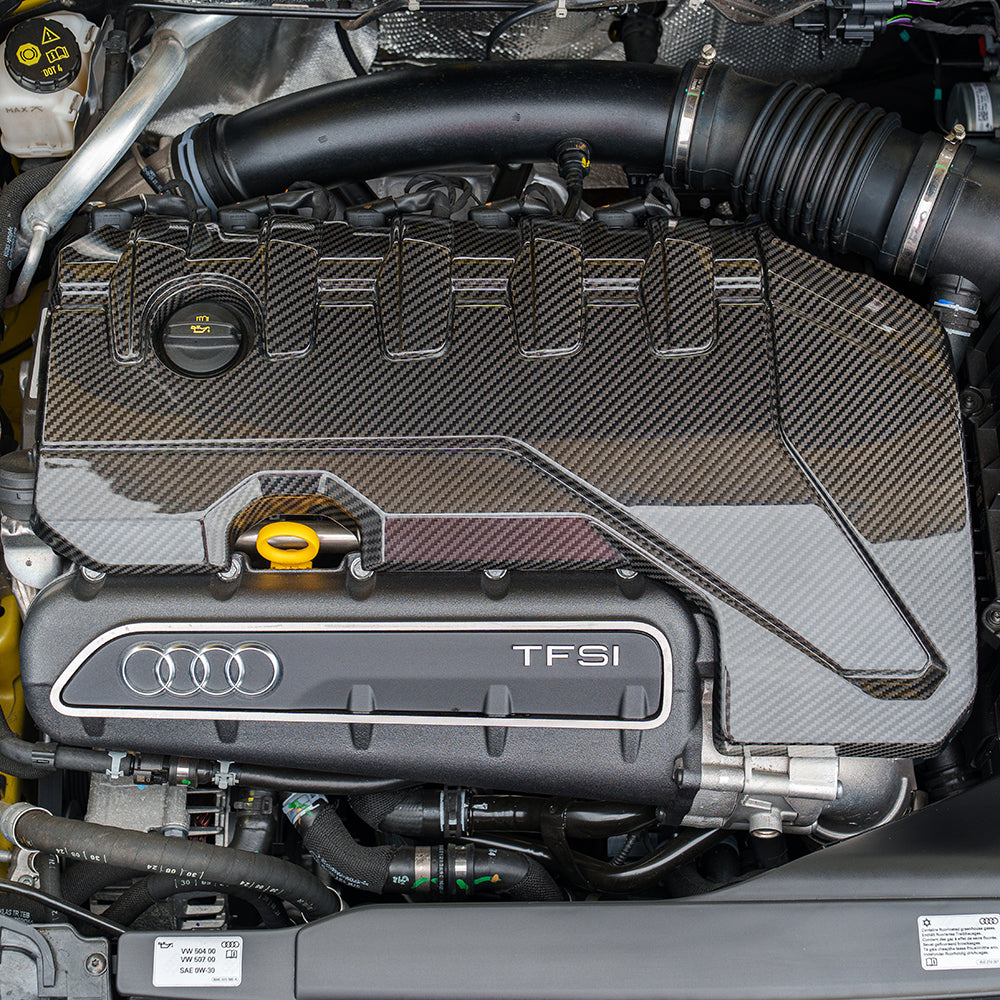CT Carbon Audi RS3 8Y 2020+ carbon fibre engine cover kit installed on engine bay, showcasing sleek black carbon fibre design.