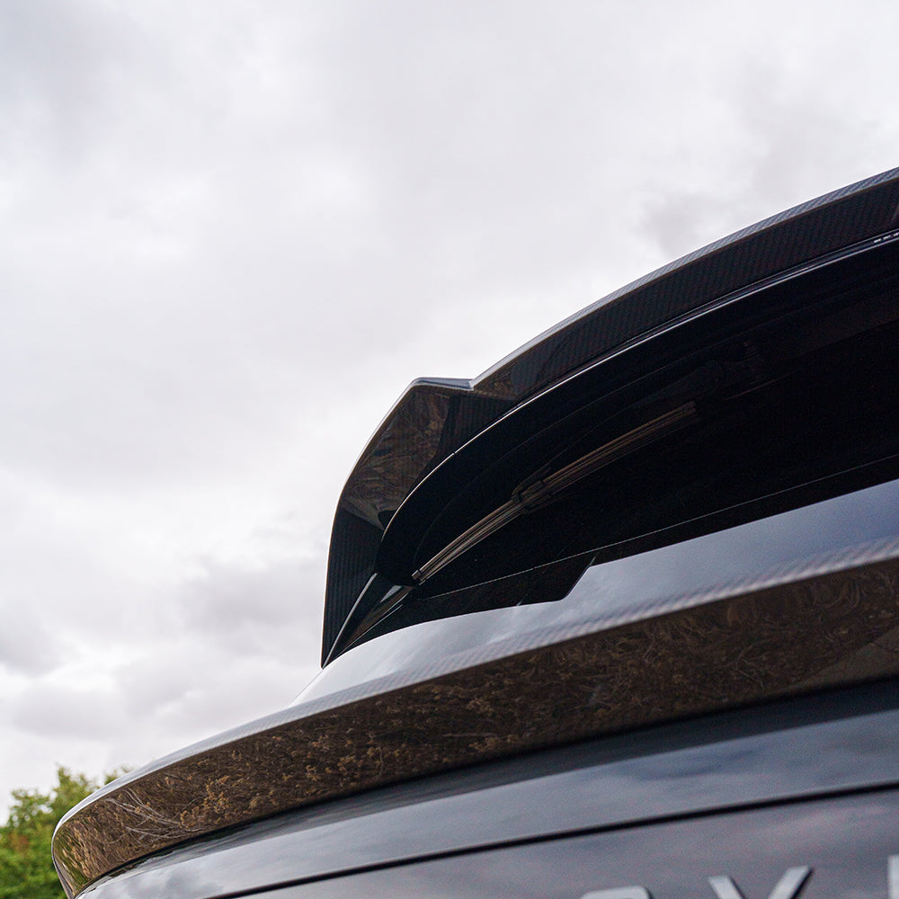 Range Rover L460 (SWB) 2022+ CT Carbon full carbon fibre kit displayed on a sleek SUV with detailed close-up views of the carbon fibre components.