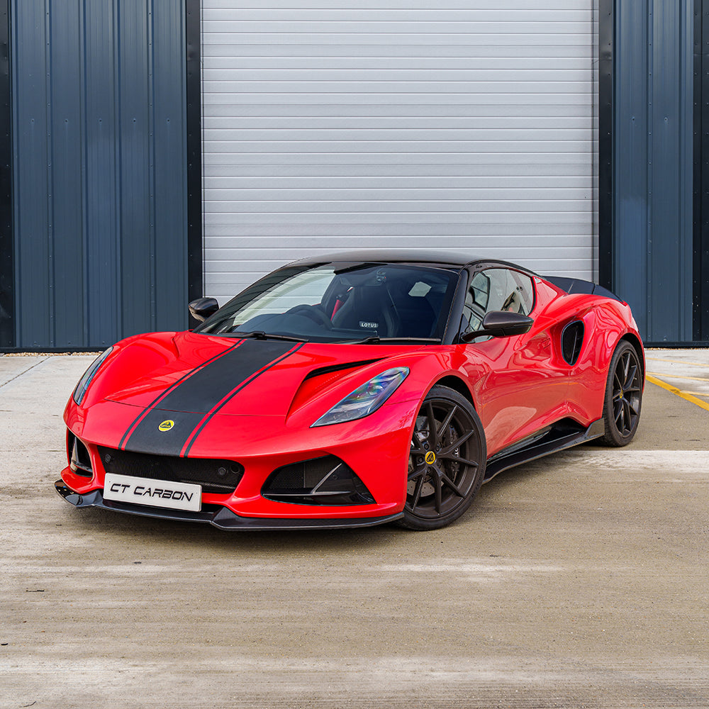 Red Lotus Emira car front splitter by CT Carbon featuring lightweight carbon fiber design for improved aerodynamics.