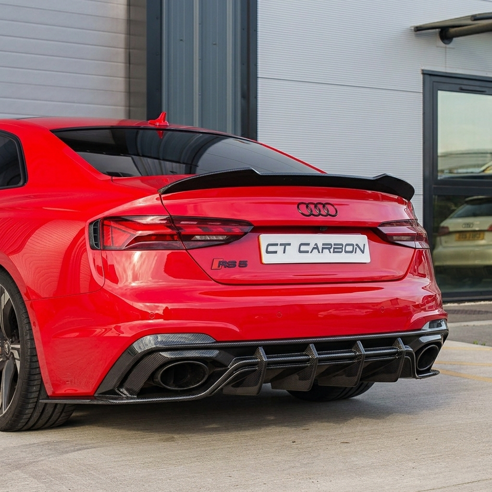 Red carbon fiber spoiler for Audi A5/S5/RS5 B9/B9.5 coupe by CT Carbon, designed to enhance sporty appearance.