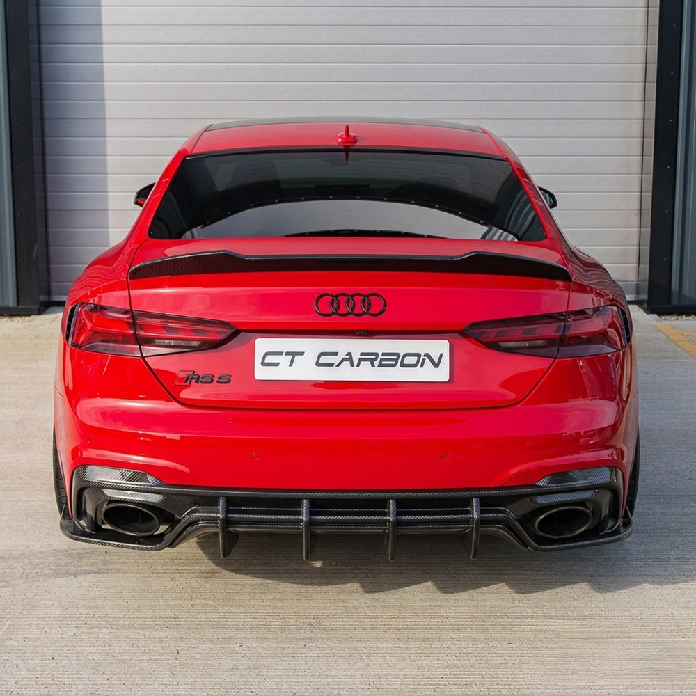Red Audi A5/S5/RS5 B9 Carbon Fibre Spoiler by CT Carbon, designed for 2016-2025 coupe models, shown on the vehicle.