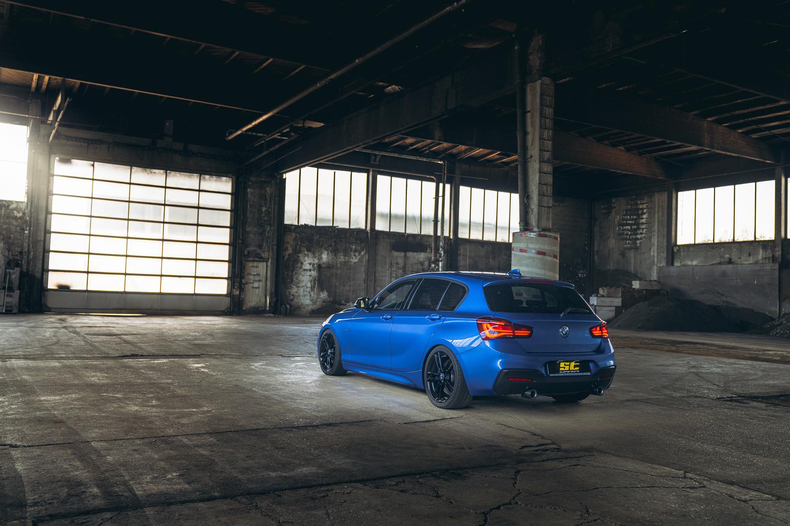 ST Suspension coilovers installed on BMW F20 M140i, showing adjustable suspension components and sporty ride height.