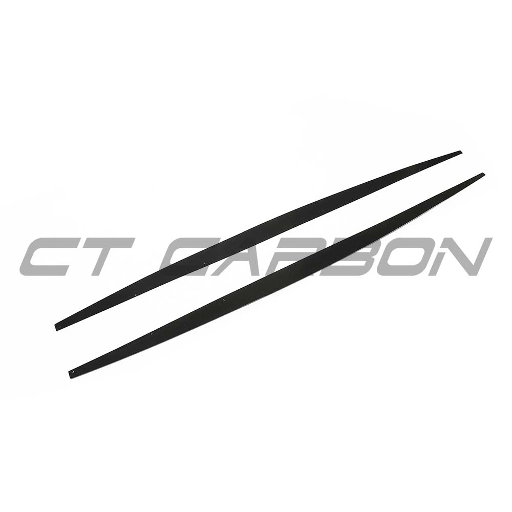 BMW F20/F21 1 Series LCI twin left gloss black side skirt kit by CT Carbon, showing close-up of sleek, aerodynamic car side panel.