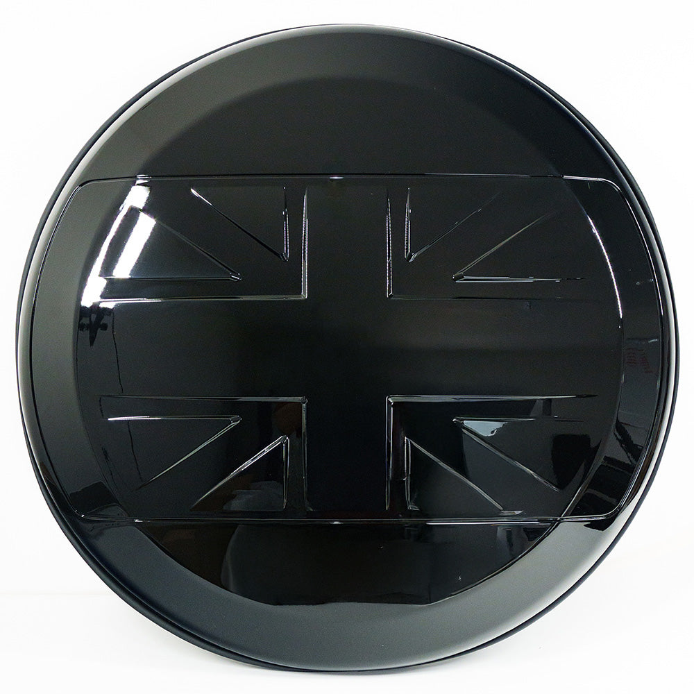 Gloss black spare wheel cover for Land Rover Defender L663 110 and 90 by CT Carbon, accessory designed for rugged vehicle protection.