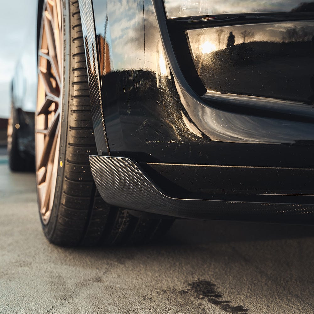 Tesla Model Y 2020-2025 full carbon fibre kit by CT Carbon, includes front, side, and rear components for a sleek upgrade.