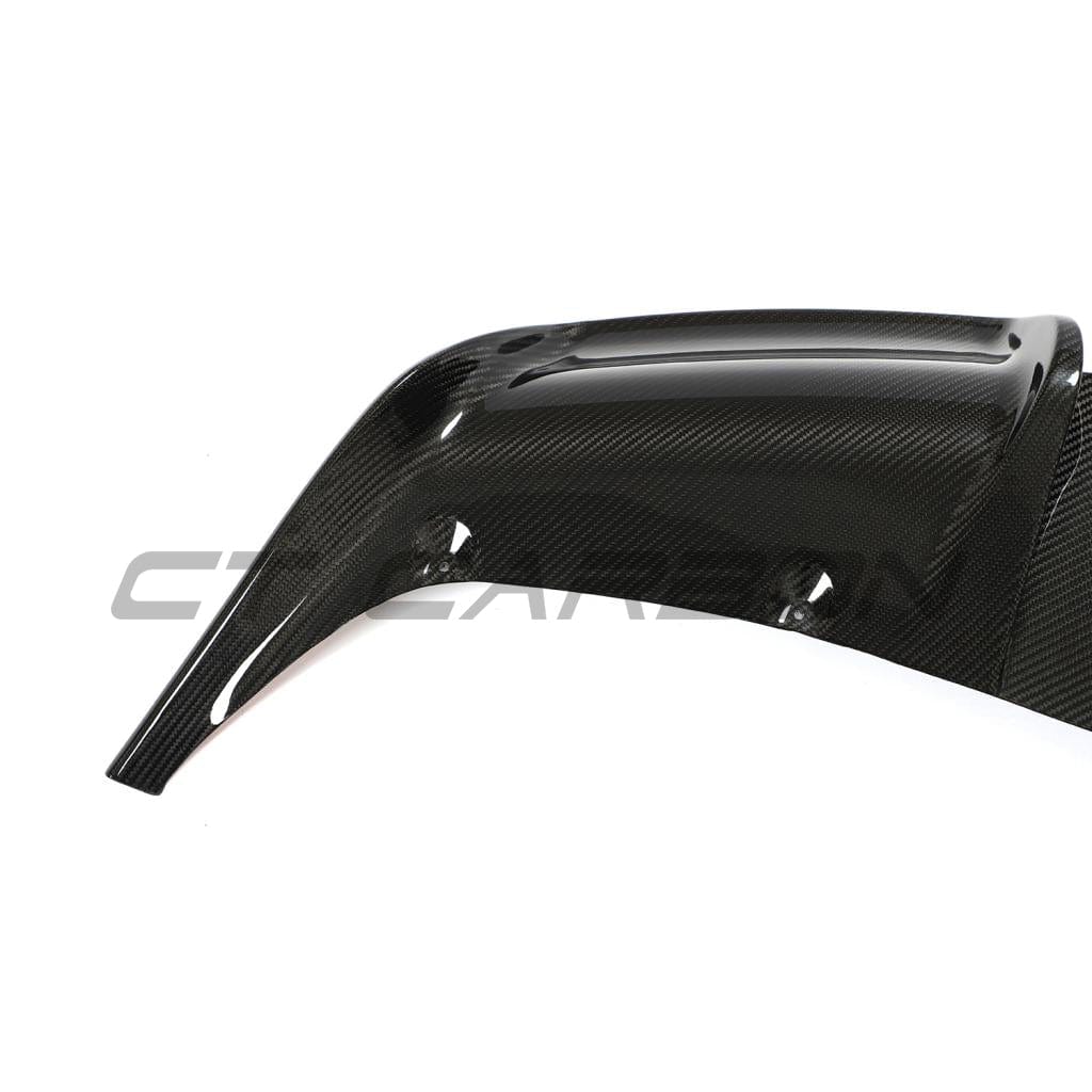 Tesla Model Y MK1 2020-2025 carbon fibre full kit by CT Carbon, shown in a comprehensive view of the textured carbon fibre components.