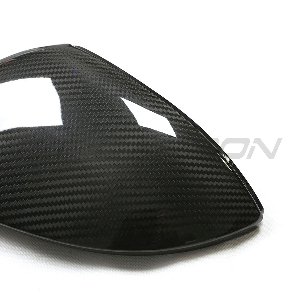 Volkswagen Golf MK8 carbon fibre mirrors with lane assist from CT Carbon, showing sleek design and integrated lane guidance features.