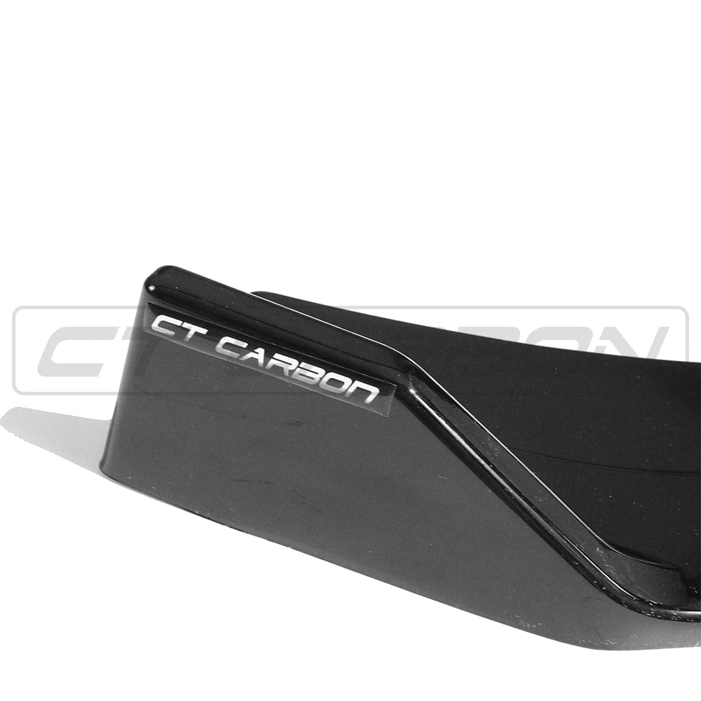 Volkswagen Golf R/GTD/GTI MK7/7.5 2014-2020 CT Carbon gloss black splitter installed on front bumper, showcasing aerodynamic car upgrade.