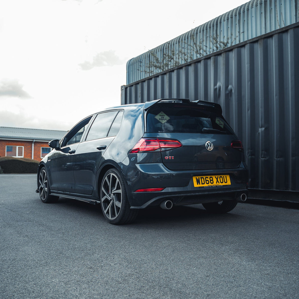 CT Carbon gloss black spoiler for Volkswagen Golf R, GTD, GTI MK7/7.5 2014-2020, shown on car with sleek finish.