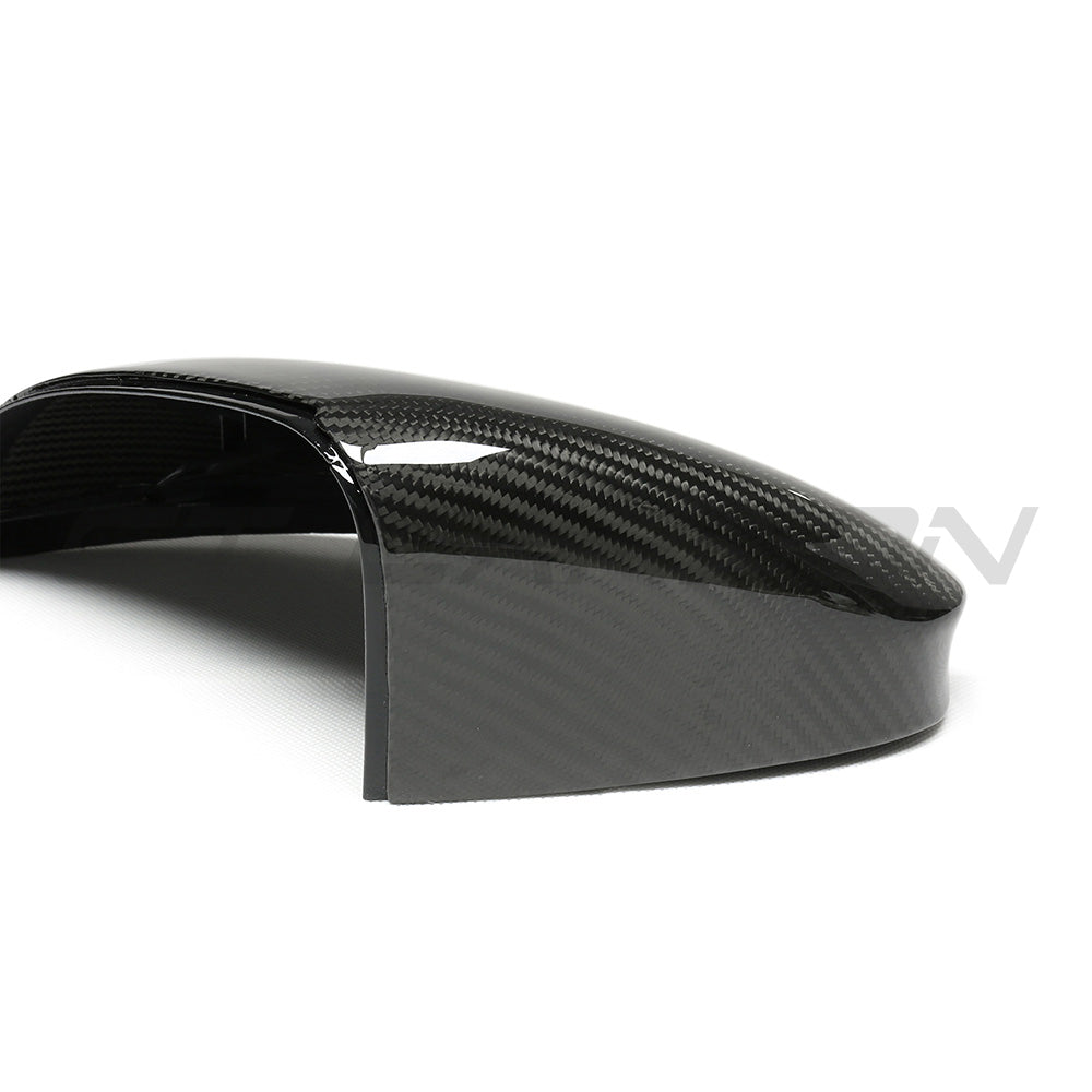 VW Golf MK8 carbon fiber side mirrors by CT Carbon, featuring sleek carbon finish without lane assist, shown from a side angle.