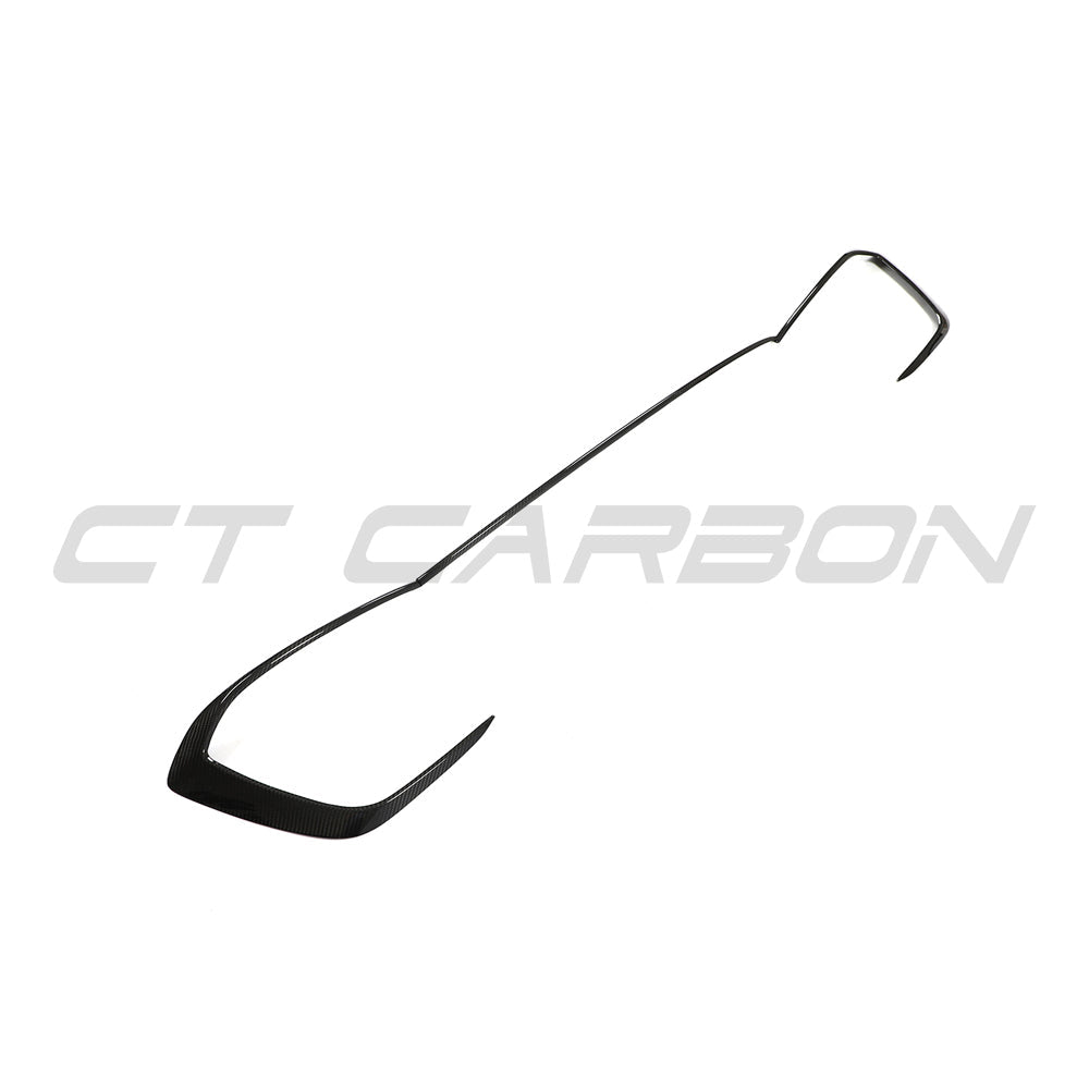 VW Golf MK8 GTI carbon fibre front trim accessory by CT Carbon, showcasing the sleek, textured carbon fibre design for the vehicle's front.