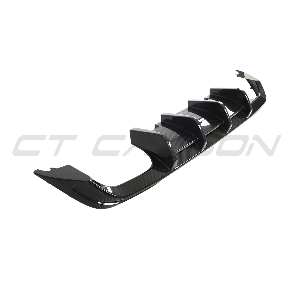 VW MK8 Golf R CT Design full carbon fiber kit showing the carbon diffuser with detailed weave pattern on a black car.