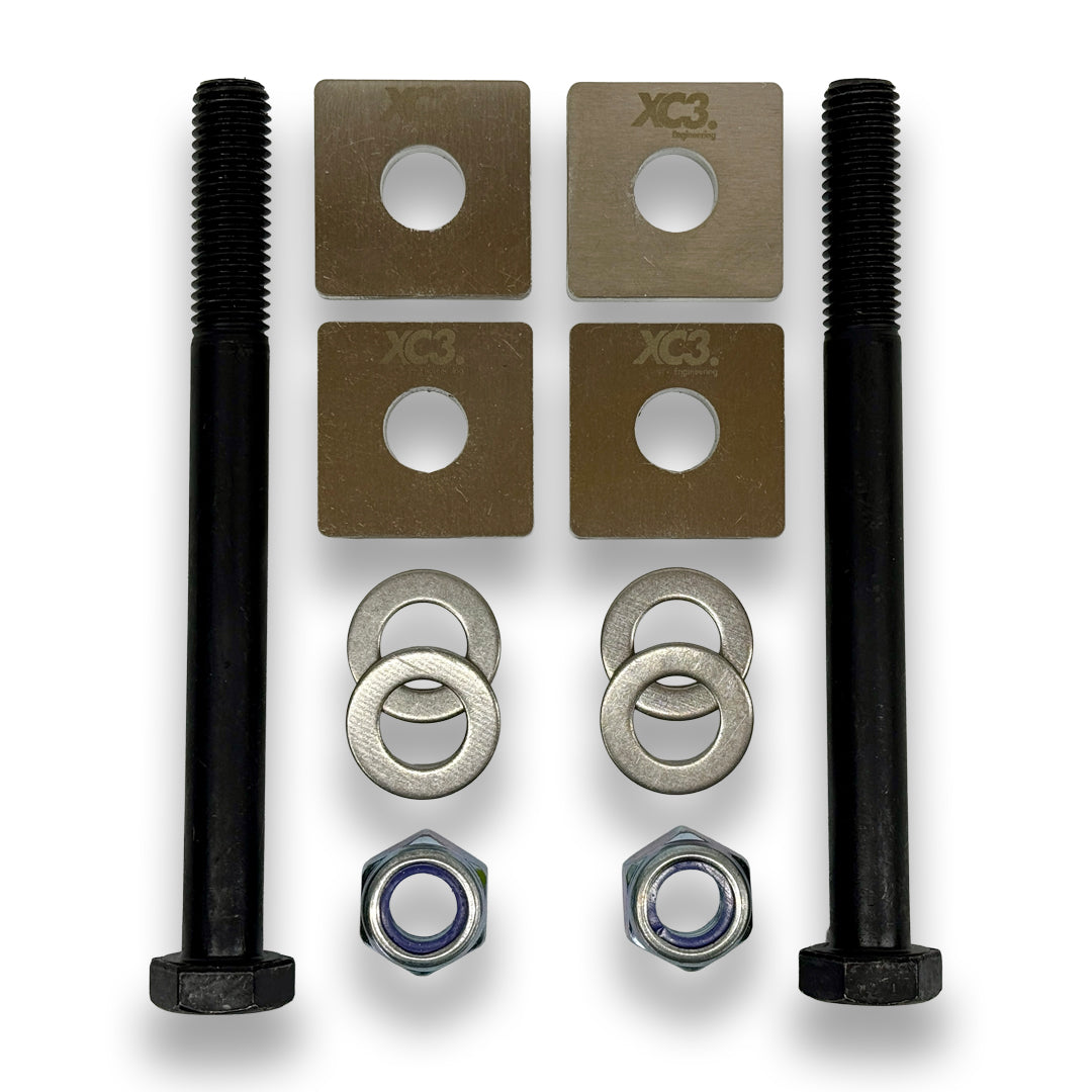 BMW M3 E92 E9X rear toe lockout shim kit by XC3 Engineering for suspension and alignment adjustment.