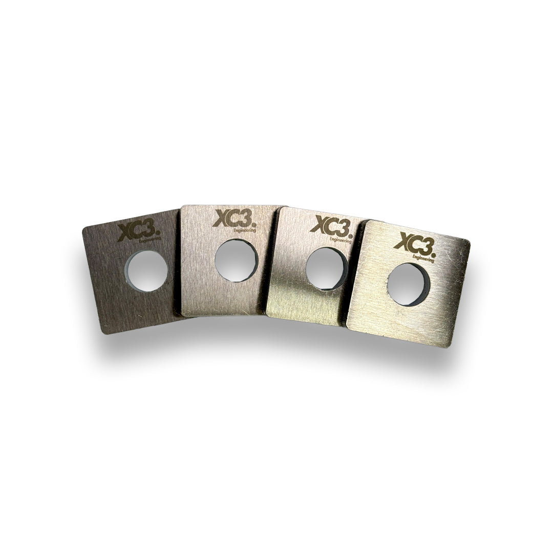 BMW M3 E92 E9X rear toe lockout shim kit from XC3 Engineering, suspension and alignment component for improved handling.