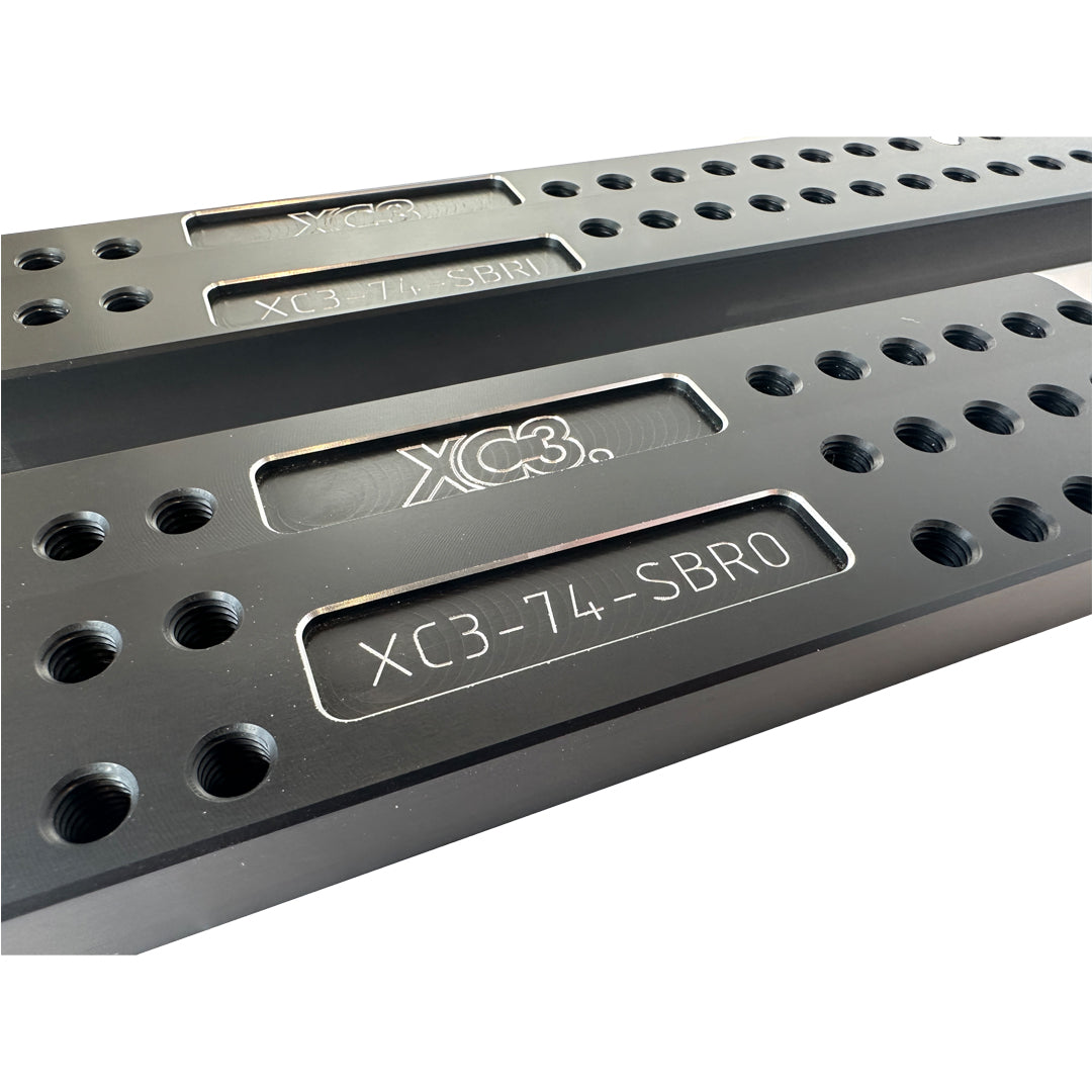 Universal BMW M3 E9X/E92 seat-base floor mount adapter bracket kit by XC3 Engineering for interior and safety upgrades.