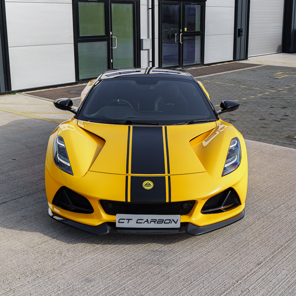 Yellow Lotus Emira 2022+ full carbon fibre kit by CT Design, including hood, side skirts, and rear diffuser, on a sports car.
