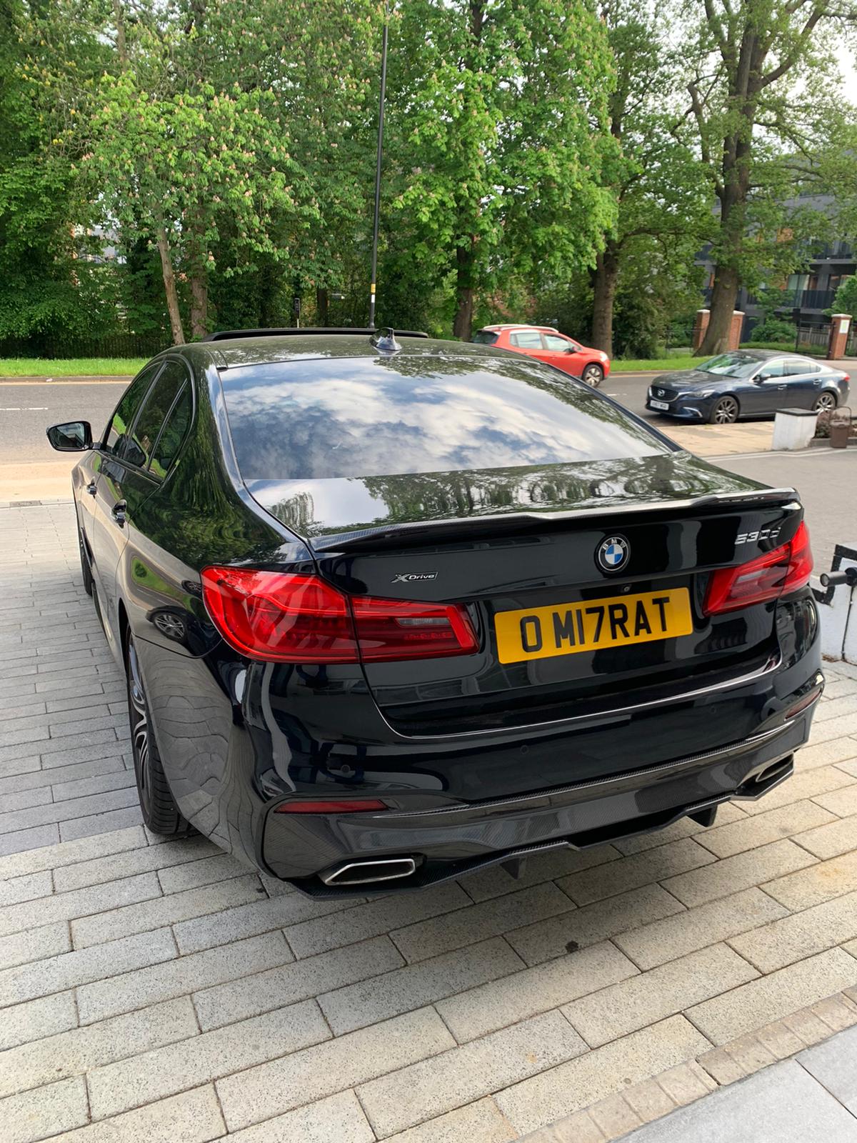 BMW G30 G31 5 Series 2020-2024 LCI gloss black diffuser by CT Carbon, showcasing sleek MP style design for enhanced rear aesthetics.