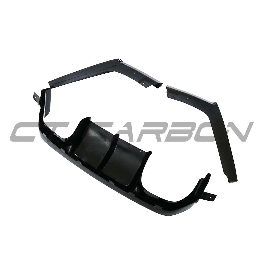 Black CT Carbon V-style diffuser for BMW M3 M4 F80 F82 F83, showcasing the sleek gloss black finish and aerodynamic design.