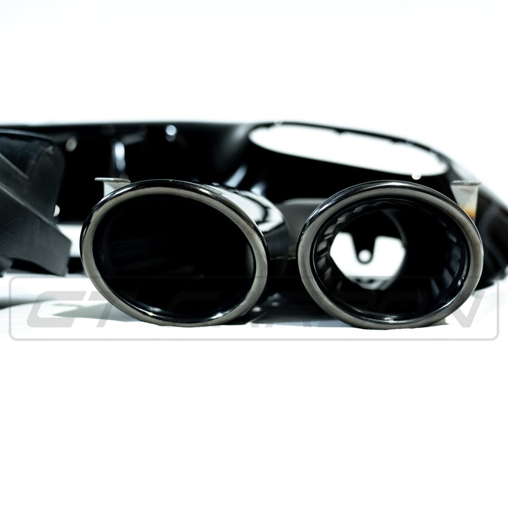 Gloss black CT Carbon diffuser with quad tips for Mercedes A-Class W177/V177 2018-current, showcasing sleek automotive design.