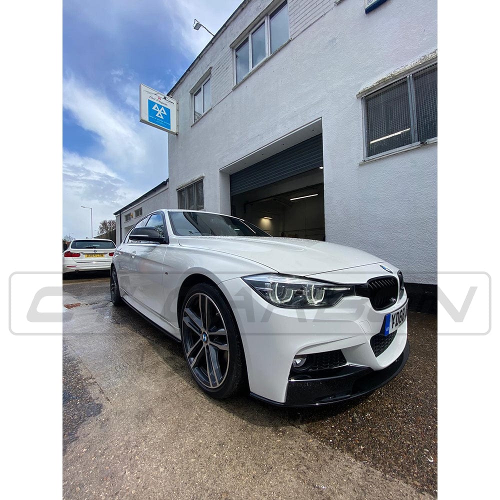 BMW 3 Series F30 gloss black full kit with twin exhaust exits by CT Carbon, featuring MP style design and high-quality finish.