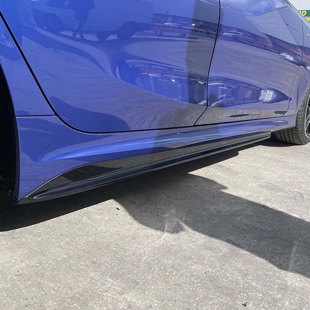 BMW 3 Series G20 gloss black full kit with square exhaust by CT Carbon, featuring sleek black finish and MP-style exhaust exit.