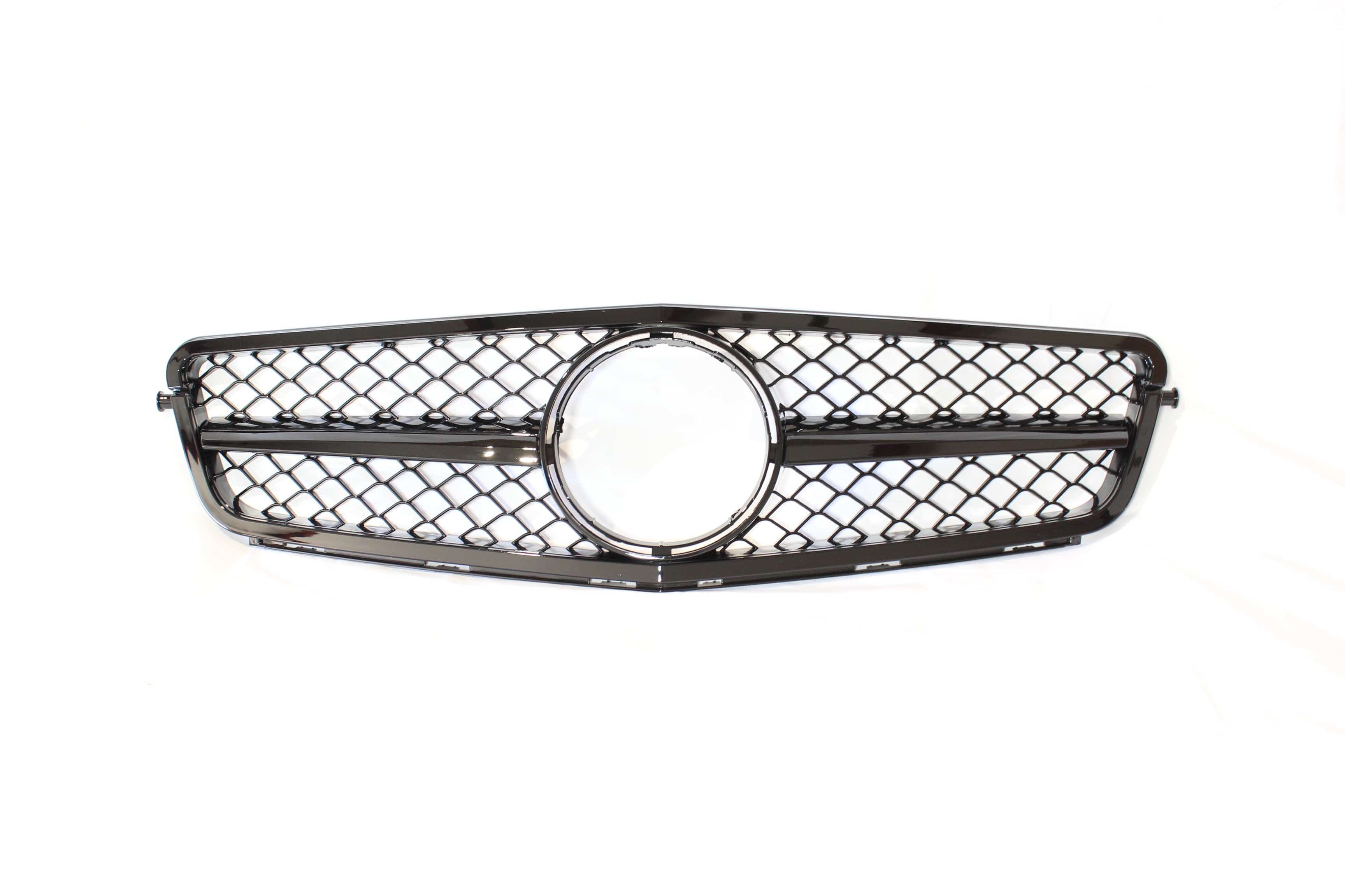 Black CT Carbon grille for Mercedes W204 C-Class, featuring a sleek design with mesh pattern and AMG styling accents.