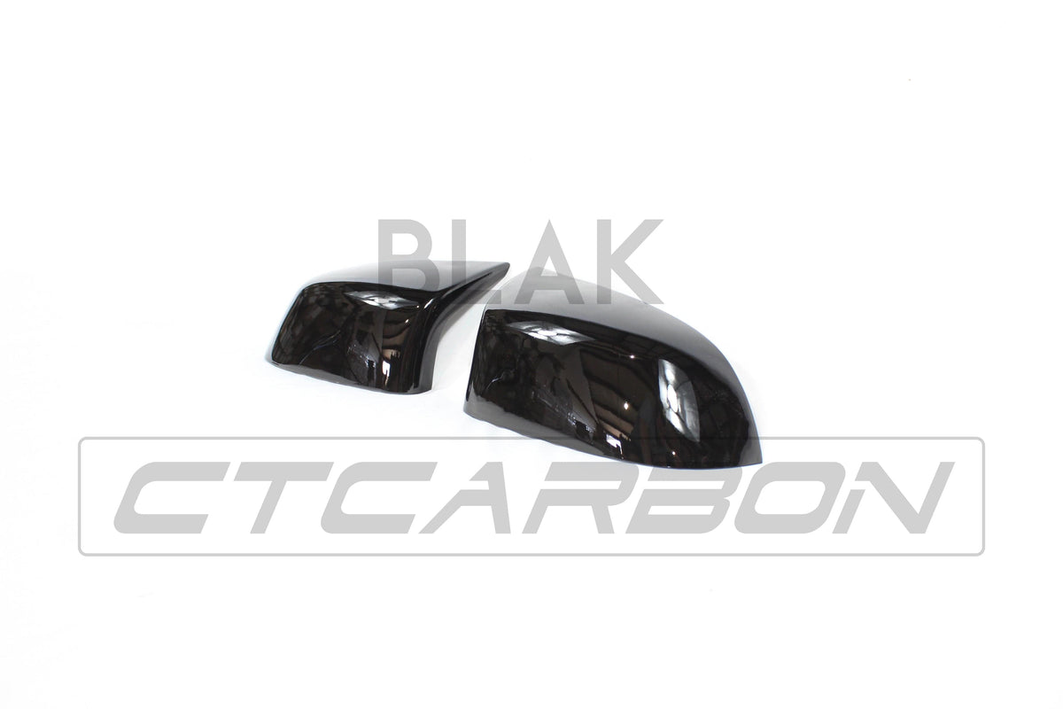 Gloss black mirror replacements for BMW F15 F16 X5 X6 from CT Carbon, showing sleek exterior side mirrors.