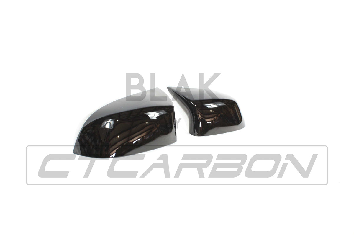 Gloss black mirror replacements for BMW F15/F16 X5/X6 from CT Carbon, showing sleek exterior side mirrors with a glossy black finish.