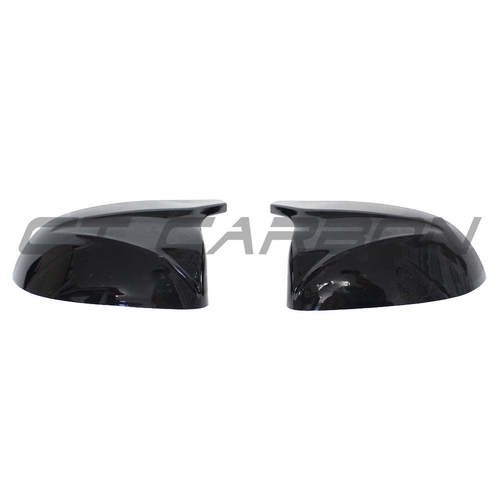 Gloss black BMW X3, X4, X5, X6 G01, G02, G05, G06 mirrors by CT Carbon, showcasing sleek exterior accessories.
