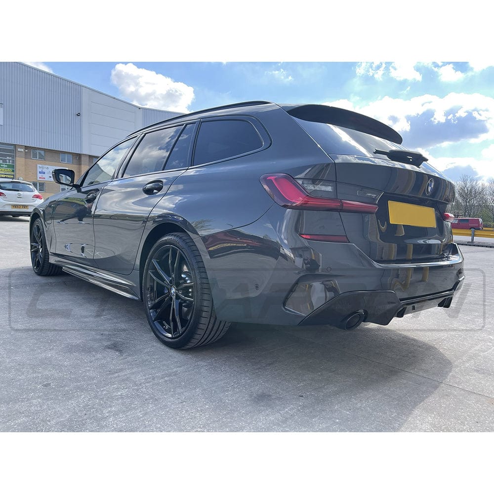 BMW 3 Series G20 G21 gloss black side skirts by CT Carbon, featuring sleek MP style design for a sporty look.