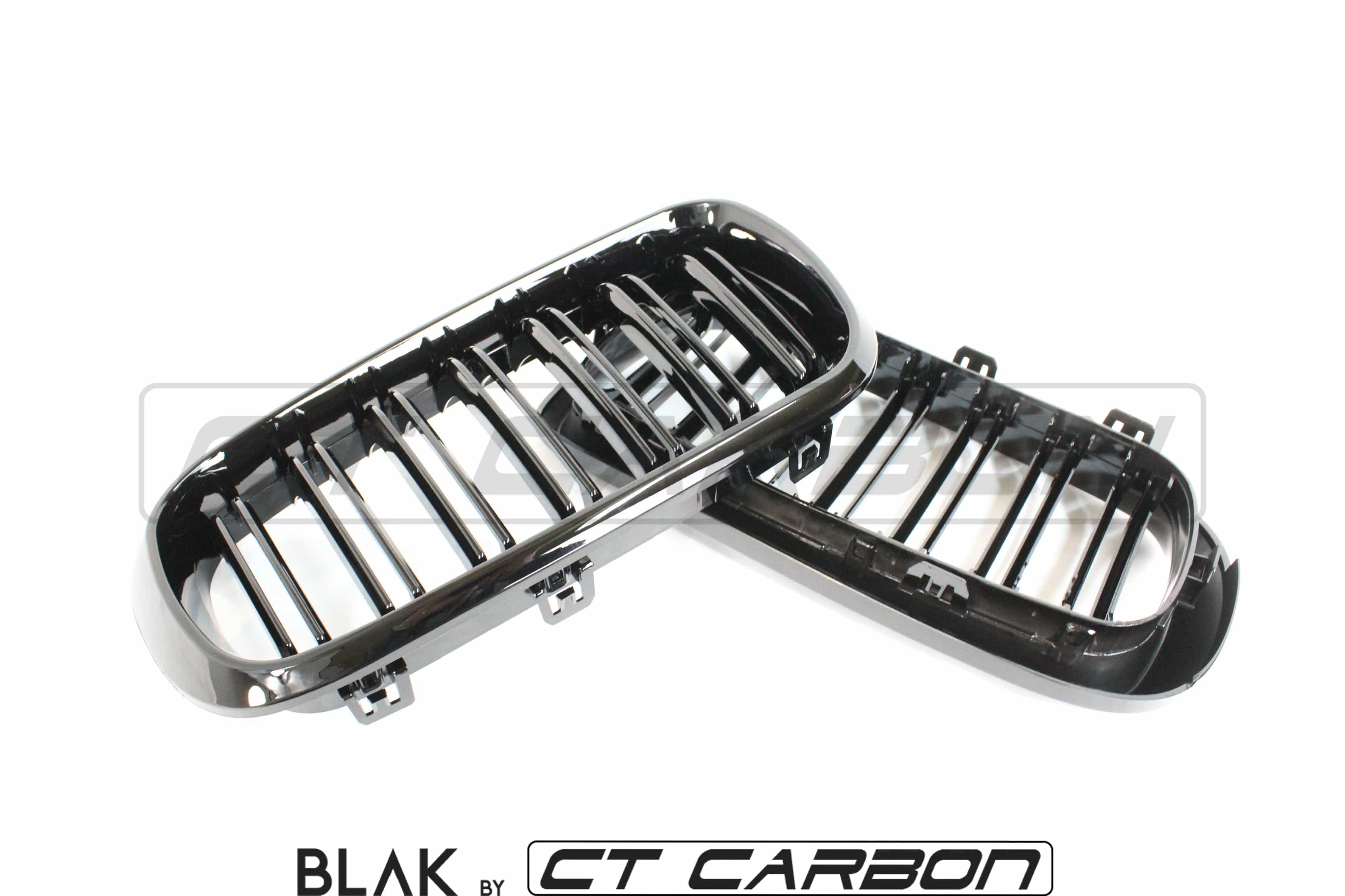 Black CT Carbon double slat grille for BMW X5M F15 and X6M F16 models, featuring a sleek, aerodynamic design.