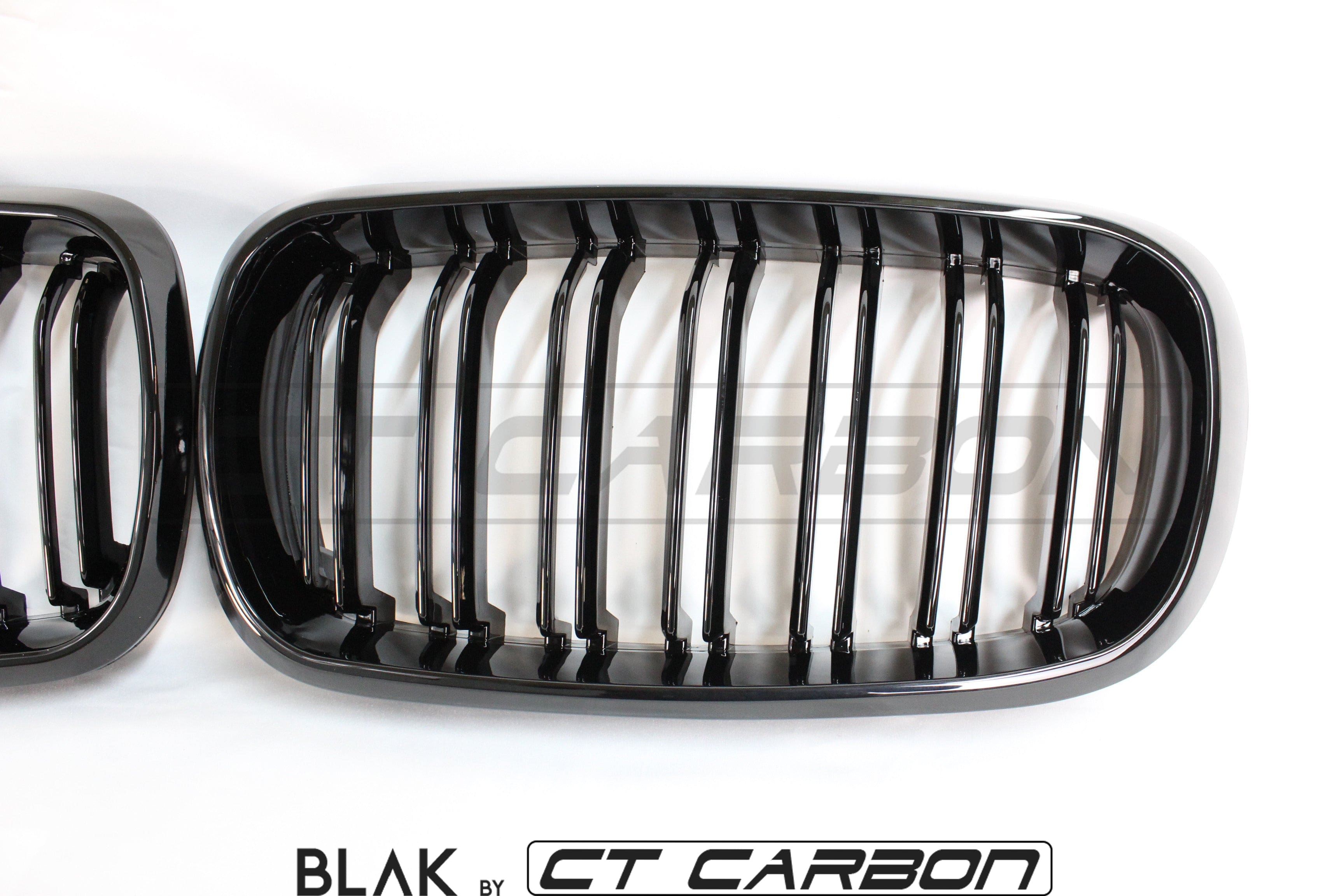 Black CT Carbon double slat grille for BMW X5M and X6M F15 and F16 models, showcasing sleek, high-performance automotive design.