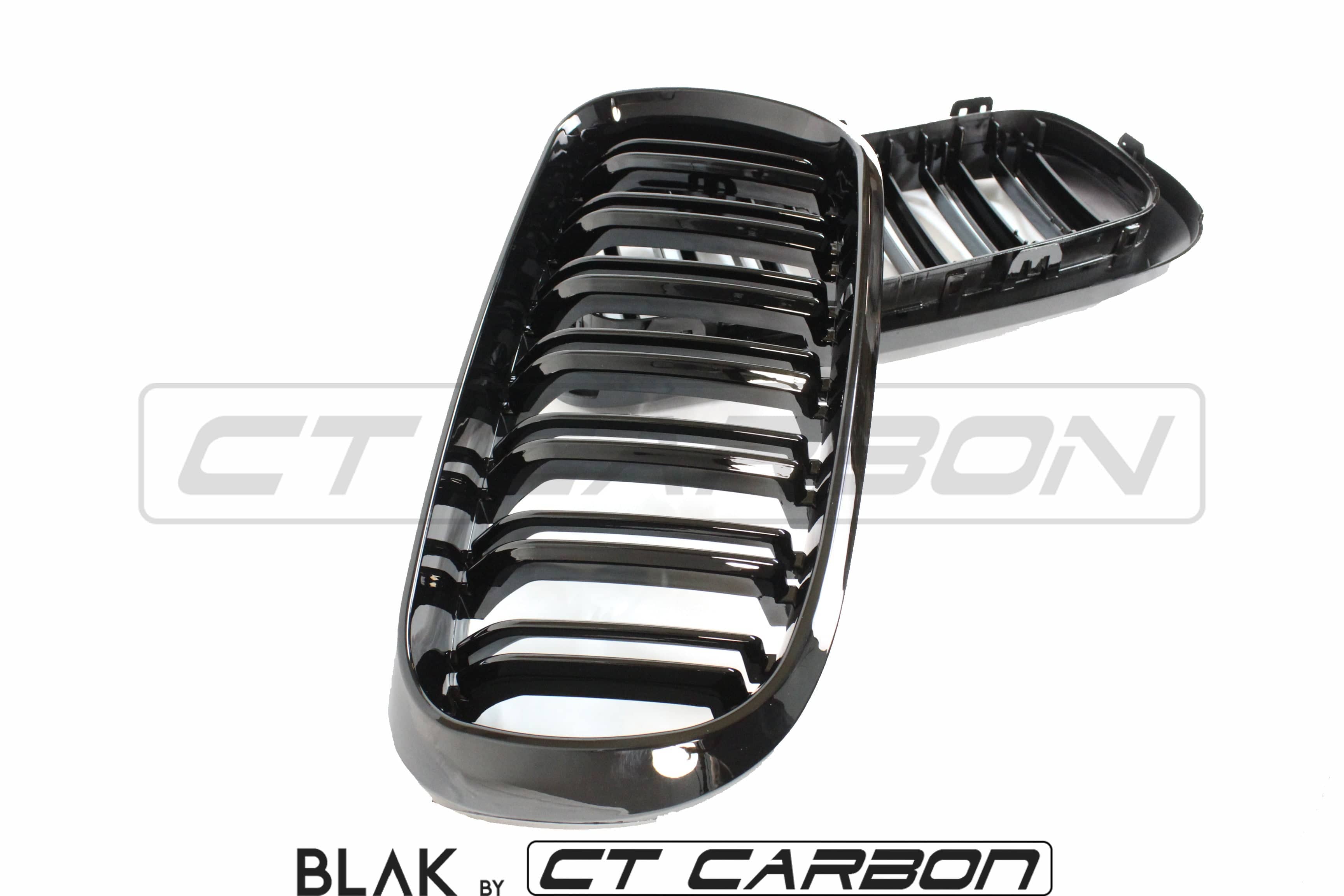 Black CT Carbon double slat grille for BMW X5M and X6M F15 and F16 models, featuring sleek split design and high-quality carbon finish.
