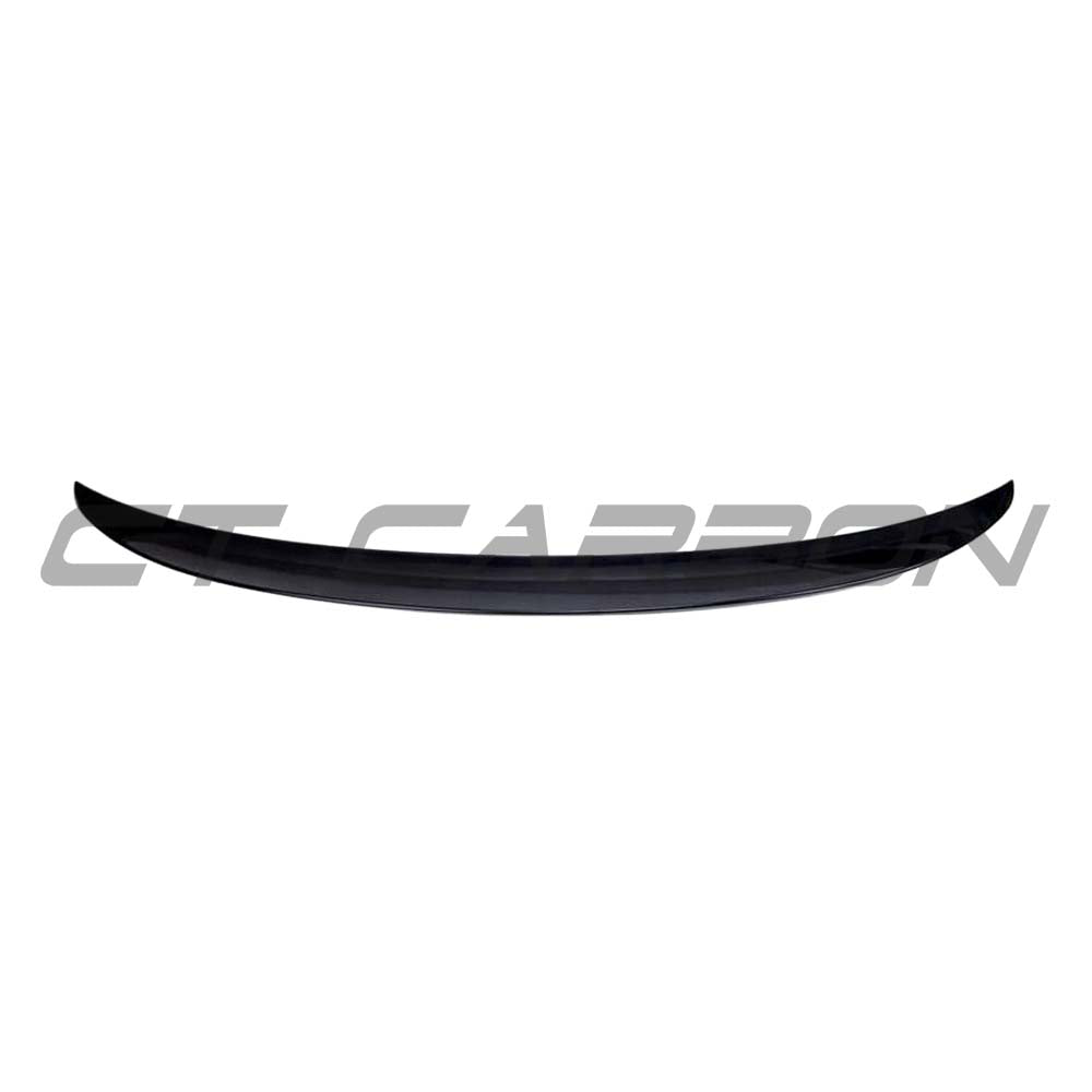 Gloss black BMW 2 Series F23 full kit with twin exhaust from CT Carbon, featuring a sleek spoiler and sporty design.