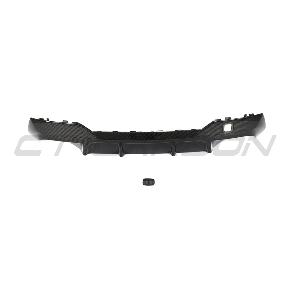 Black BMW G23 4 Series convertible carbon fibre diffuser kit by CT Carbon, showcasing sleek carbon fibre finish and aerodynamic design.