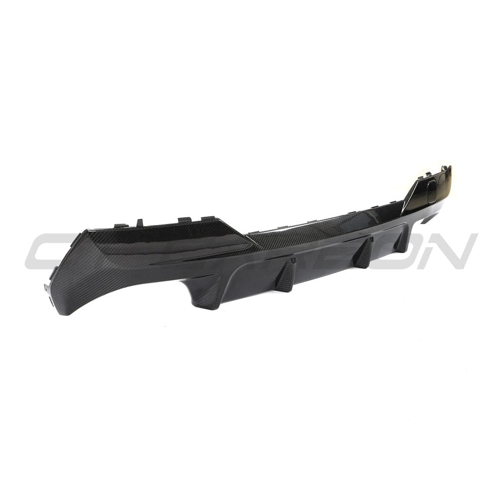 Black BMW G23 4 Series convertible carbon fibre diffuser kit by CT Carbon, featuring sleek aerodynamic design.