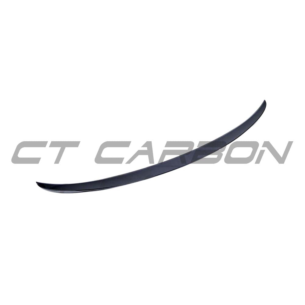 Black gloss BMW 5 Series G30 V5 spoiler by CT Carbon, showing the sleek, aerodynamic design on the vehicle's rear.