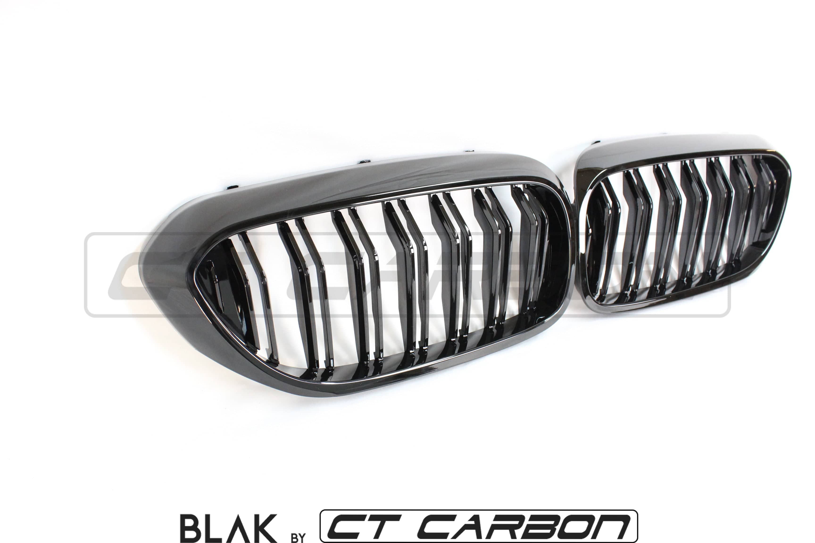 BMW M5 F90 and 5 Series G30 black double slat grille by CT Carbon, close-up view of sleek black grille design.