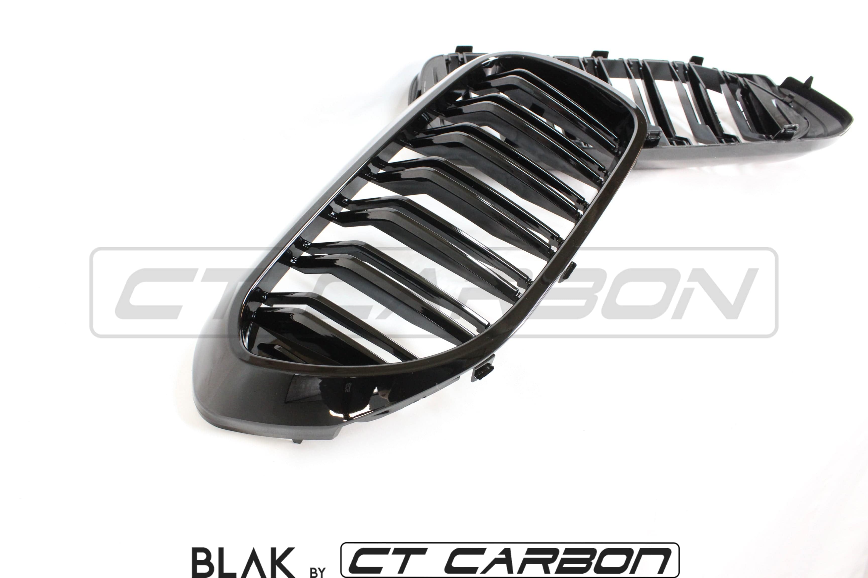 BMW M5 F90 and 5 Series G30 black double slat grille by CT Carbon, showcasing sleek black grille design for sporty appearance.