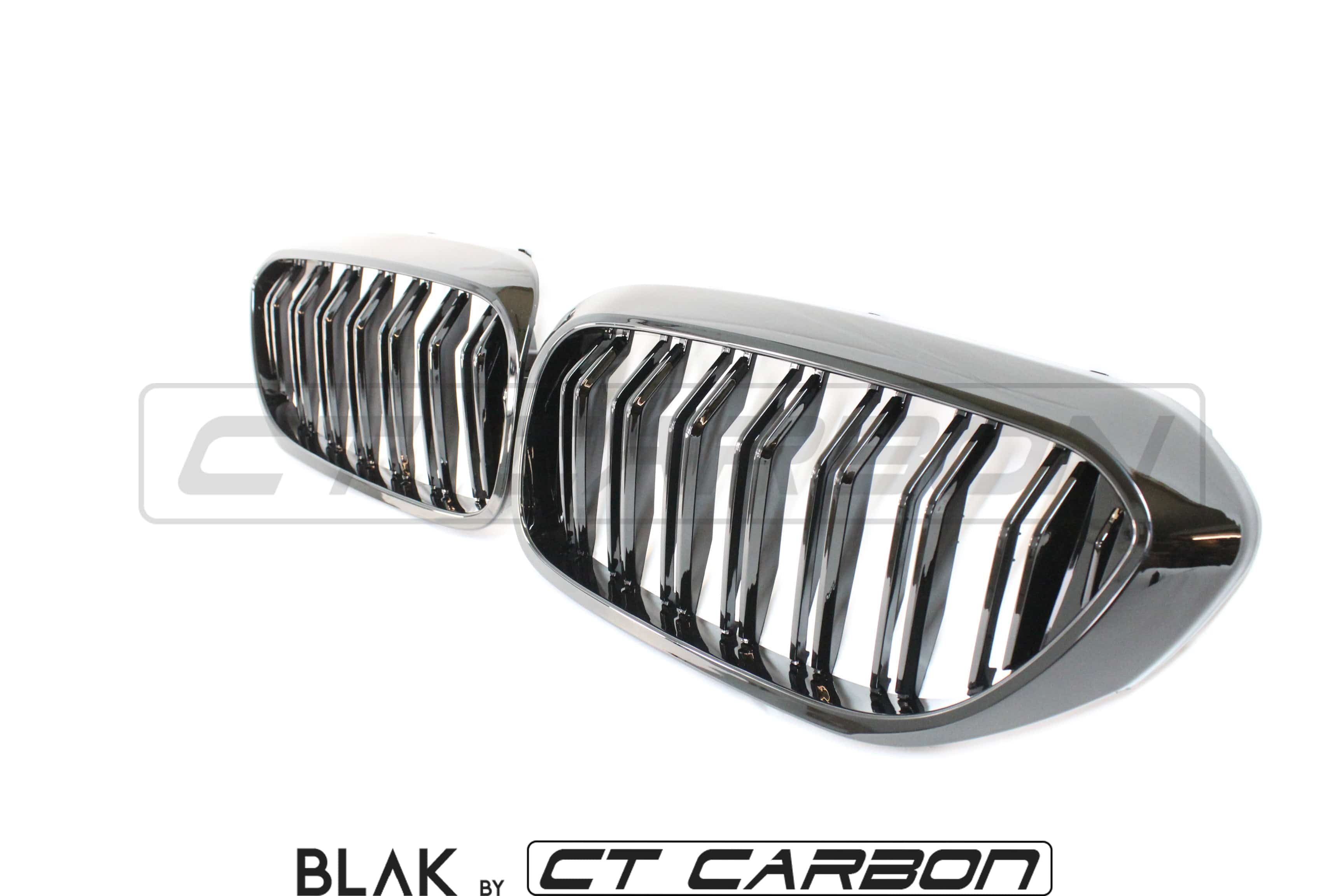 BMW M5 F90 and 5 Series G30 black double slat grille by CT Carbon, close-up of sleek black grille with dual slats and textured finish.